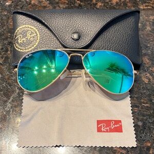 Ray-Ban Aviator Sunglasses with Blue Lenses and Gold Frame